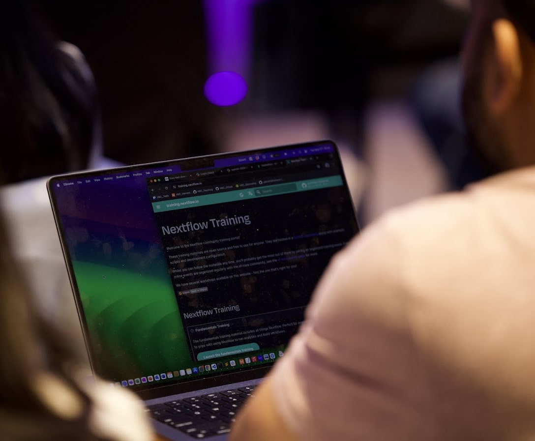 person working on laptop during hackathon